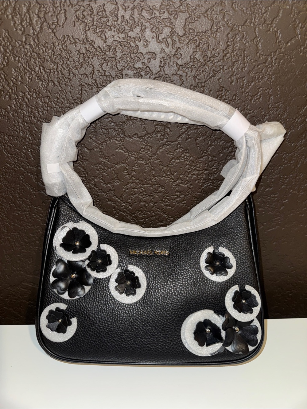 Michael Kors Black Leather Shoulder Bag with Floral Appliqués